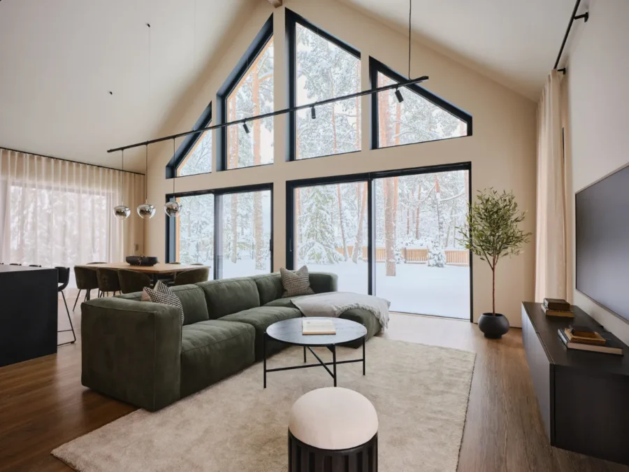 Soome Maja puitmaja, elementmaja eriprojekt Ööbik. Hubane disainmaja. Elutuba, avarad aknad.